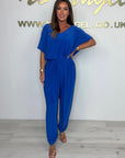 Cymara - Katoenen jumpsuit met V-hals en strikdetail
