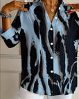 Telyra - Blouse Met Hoge Kraag Irregulier Print