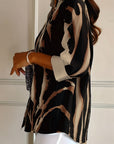 Telyra - Blouse Met Hoge Kraag Irregulier Print