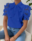 Cirelle - Effen kanten zomerblouse met strik en korte mouwen