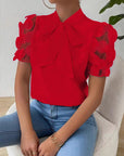 Cirelle - Effen kanten zomerblouse met strik en korte mouwen