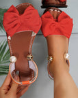 Jaxoria - Vrouwen platte sandalen met decoratieve strik en parels