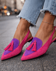 Nexoria - Elegante bicolor damesmules met trendy pompons