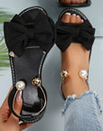Jaxoria - Vrouwen platte sandalen met decoratieve strik en parels