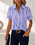 Talyria - Damesblouse in blauw met abstracte print en korte mouwen