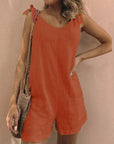 Thessara - Jumpsuit met strikbandjes en zakken
