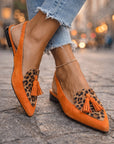 Nexoria - Elegante bicolor damesmules met trendy pompons