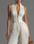 Nexavira - Elegante plissé jumpsuit met brede benen voor avonden