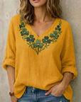Jynelle - Elegante Blouse met V-hals en Borduursel