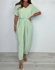 Cymara - Katoenen jumpsuit met V-hals en strikdetail