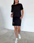 Demyra - Korte stretch jurk voor dames in zwart casual chic stijl
