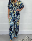 Lucia - Vrouwelijke tropische jumpsuit met korte mouwen en V-hals