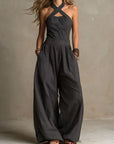 Fiorenzae - Vrouwelijke jumpsuit met vloeiende stof, kruislijf en elegante wijde benen