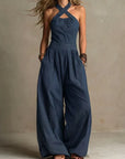 Fiorenzae - Vrouwelijke jumpsuit met vloeiende stof, kruislijf en elegante wijde benen