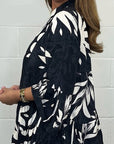 Alix - Elegante blouse met uitlopende mouwen en V-hals
