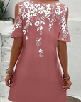 Elanora - Strapless jurk met bloemenprint en uitgesneden mouwen