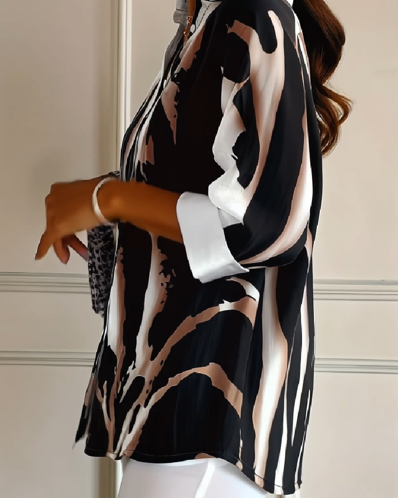 Telyra - Blouse Met Hoge Kraag Irregulier Print