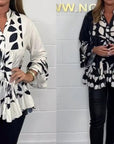 Alix - Elegante blouse met uitlopende mouwen en V-hals