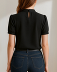 Evelia - Zwarte geplooide blouse met open mouwen