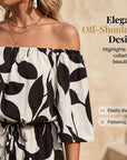 Ivoriah - Dames short jumpsuit met blote schouders en bladerenprint