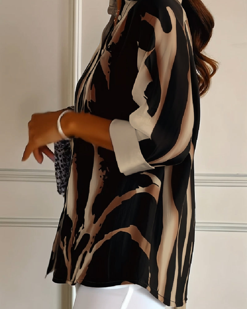 Telyra - Blouse Met Hoge Kraag Irregulier Print