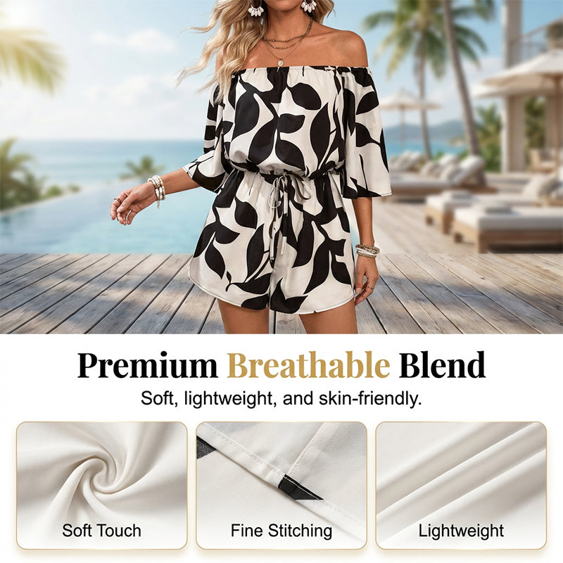 Ivoriah - Dames short jumpsuit met blote schouders en bladerenprint