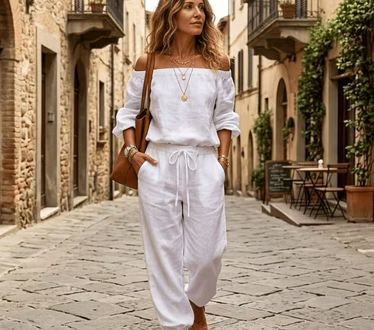 Brixavelle - Dames jumpsuit met blote schouders en strik taille van katoen