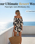 Ivoriah - Dames short jumpsuit met blote schouders en bladerenprint