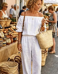 Brixavelle - Dames jumpsuit met blote schouders en strik taille van katoen