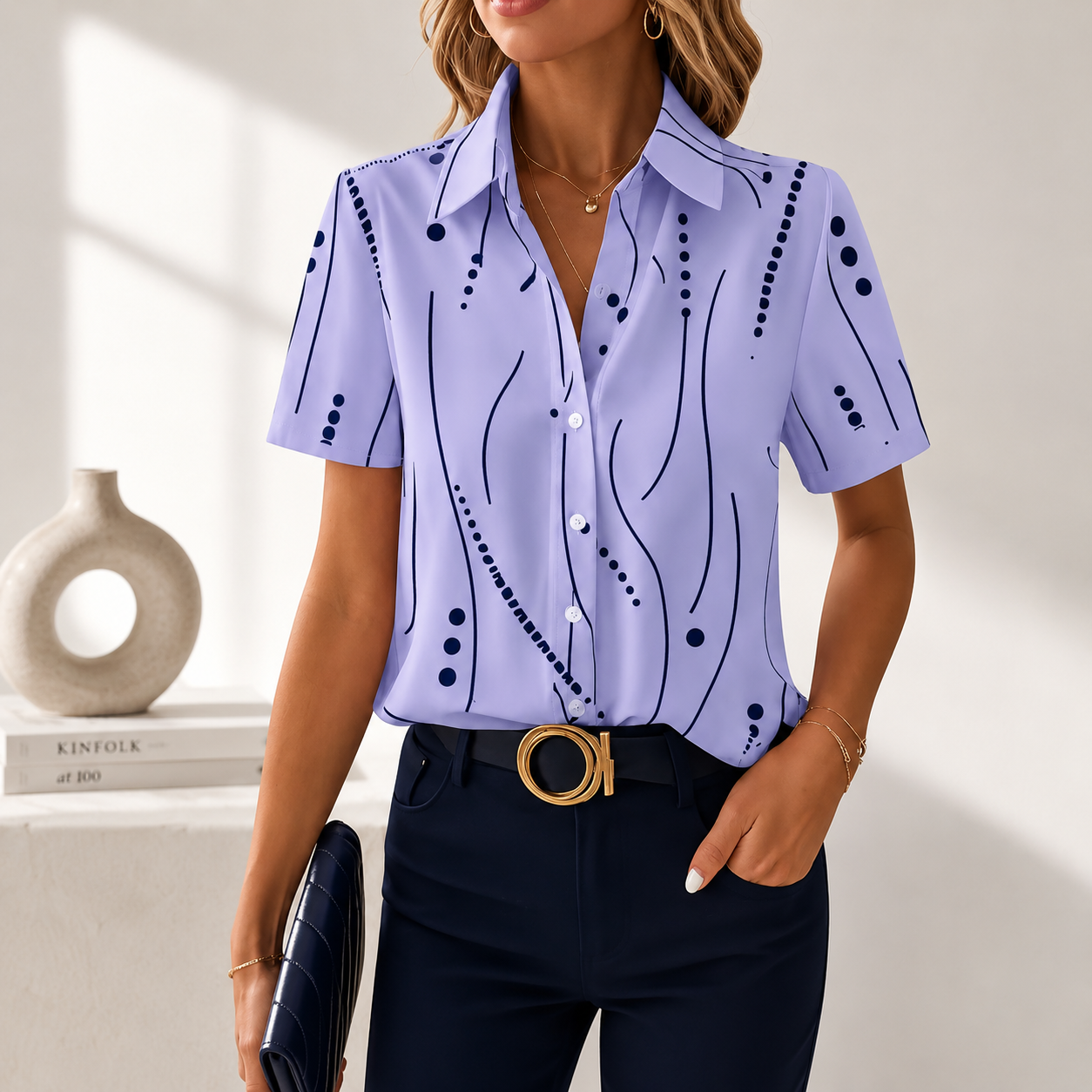 Talyria - Damesblouse in blauw met abstracte print en korte mouwen