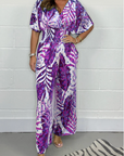 Lucia - Vrouwelijke tropische jumpsuit met korte mouwen en V-hals