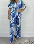 Lucia - Vrouwelijke tropische jumpsuit met korte mouwen en V-hals