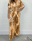 Lucia - Vrouwelijke tropische jumpsuit met korte mouwen en V-hals