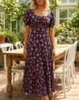 Cirella - Midi jurk voor dames in zwart met roze bloemenprint
