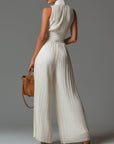 Nexavira - Elegante plissé jumpsuit met brede benen voor avonden