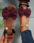 Jaxoria - Vrouwen platte sandalen met decoratieve strik en parels