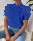 Cirelle - Effen kanten zomerblouse met strik en korte mouwen