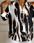 Telyra - Blouse Met Hoge Kraag Irregulier Print