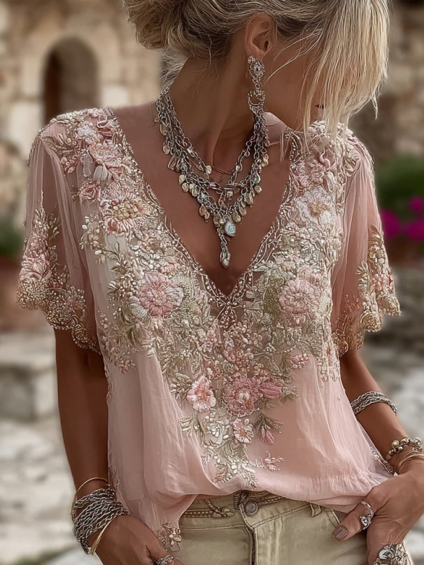 Kirelina - Vrouwelijke blouse met geborduurde bloemen en elegante V-hals