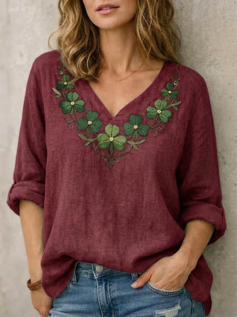 Jynelle - Elegante Blouse met V-hals en Borduursel