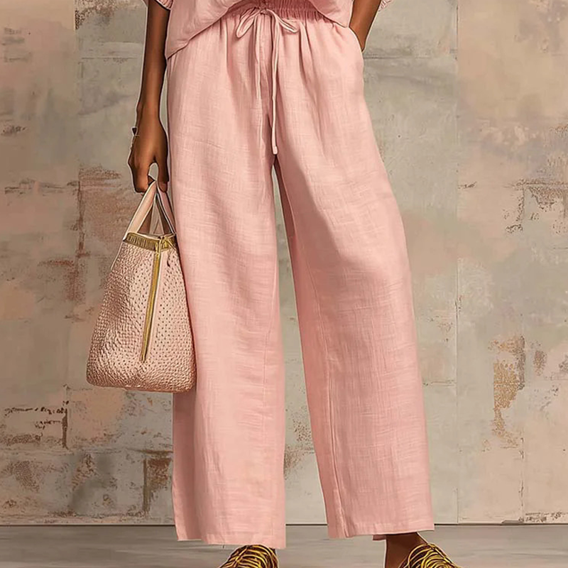 Calyndra - Dames tweedelig ensemble met rits-top en brede broek