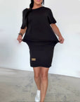 Demyra - Korte stretch jurk voor dames in zwart casual chic stijl
