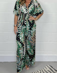 Lucia - Vrouwelijke tropische jumpsuit met korte mouwen en V-hals