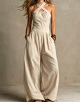 Fiorenzae - Vrouwelijke jumpsuit met vloeiende stof, kruislijf en elegante wijde benen