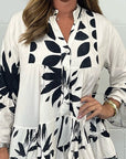 Alix - Elegante blouse met uitlopende mouwen en V-hals