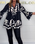 Alix - Elegante blouse met uitlopende mouwen en V-hals