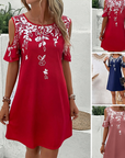 Elanora - Strapless jurk met bloemenprint en uitgesneden mouwen