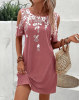 Elanora - Strapless jurk met bloemenprint en uitgesneden mouwen